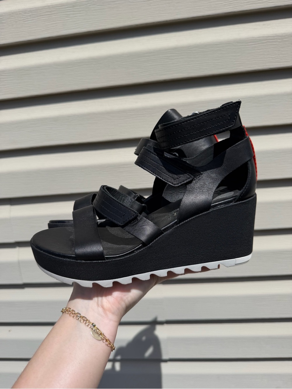 Sorel Black Wedge Sandals with Red Heel Accent